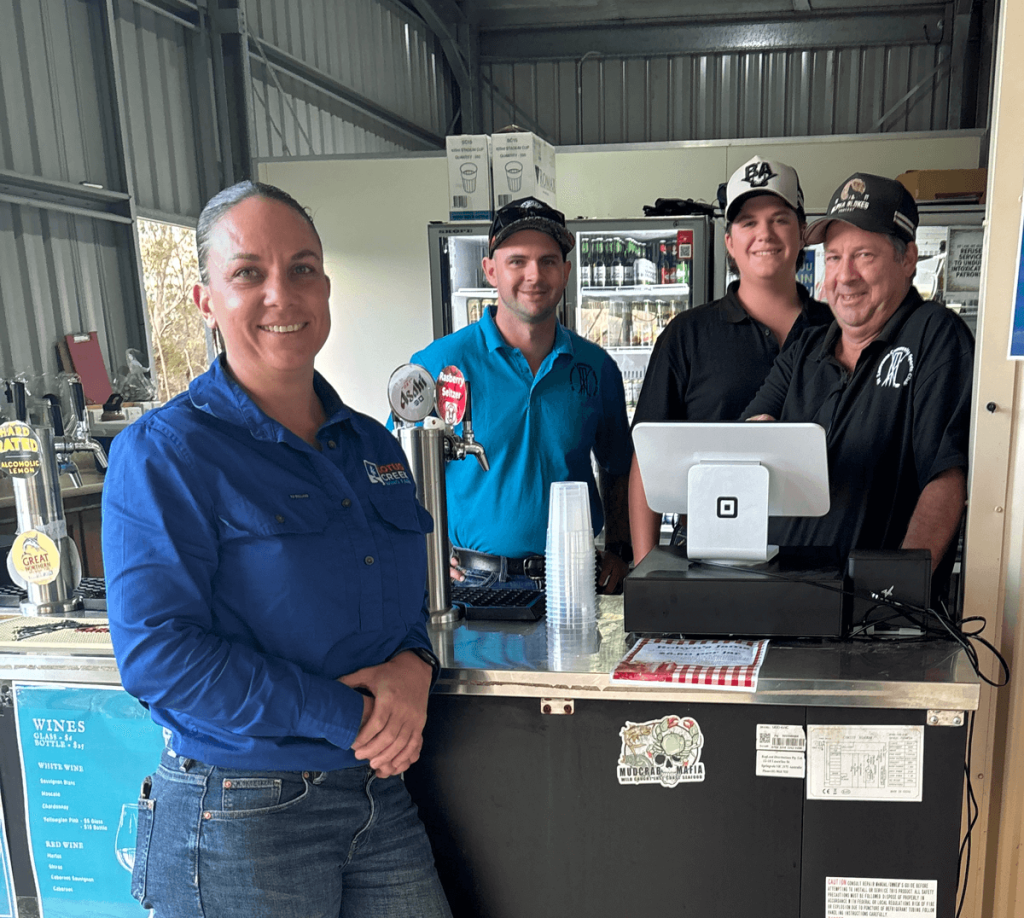 Four people at a coffee shop.